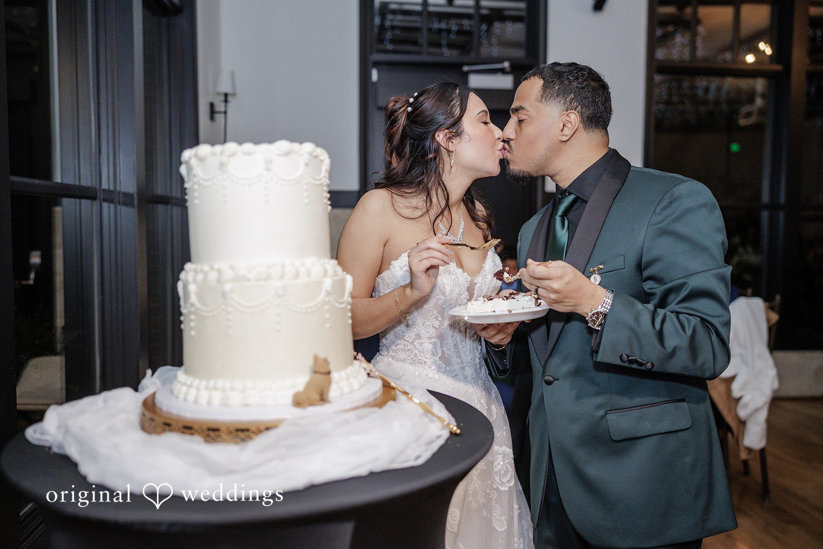 Cassandra + Benjamin The couple shares a romantic kiss