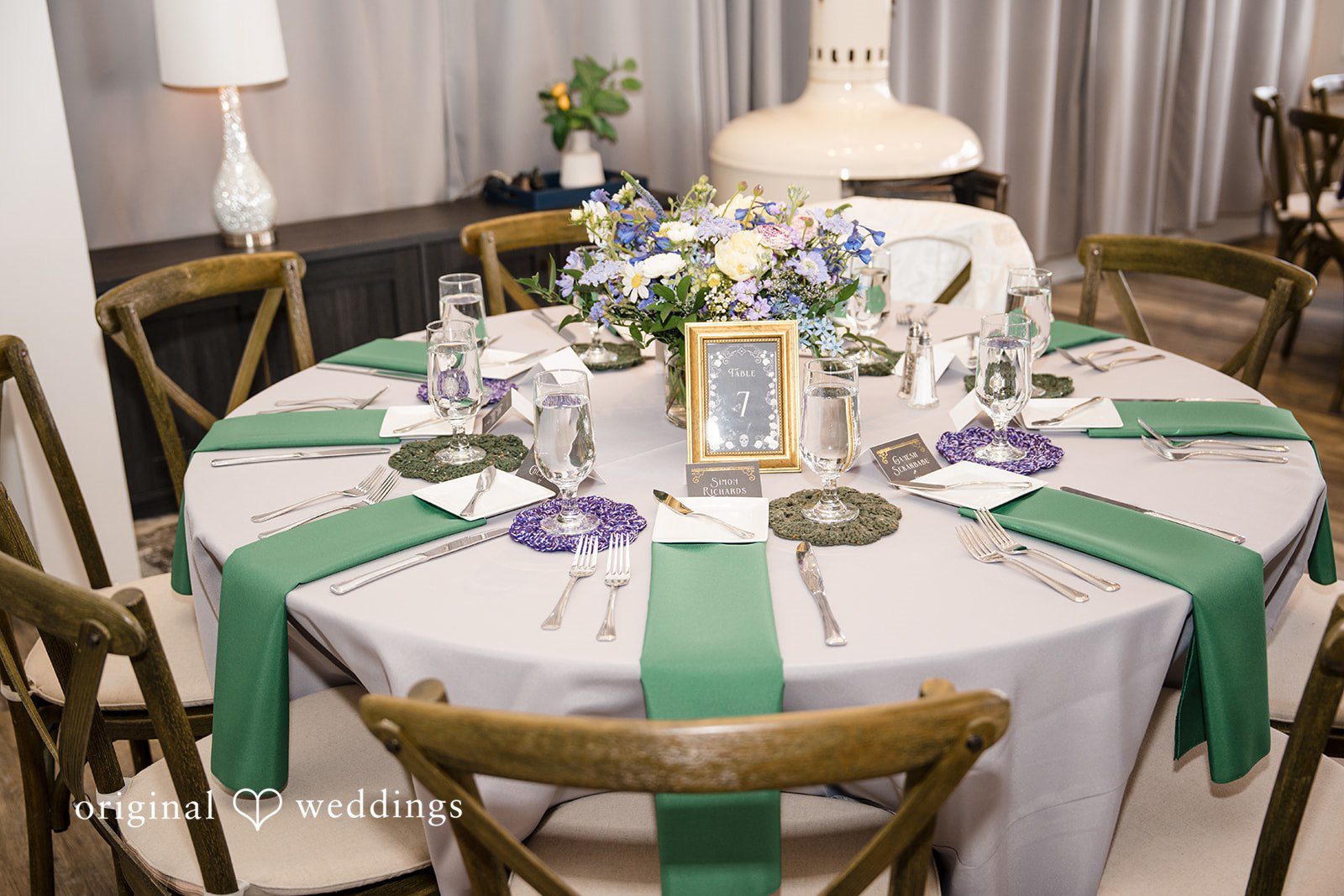 Morgan + Todd Detailed reception table decor with candles and floral arrangements
