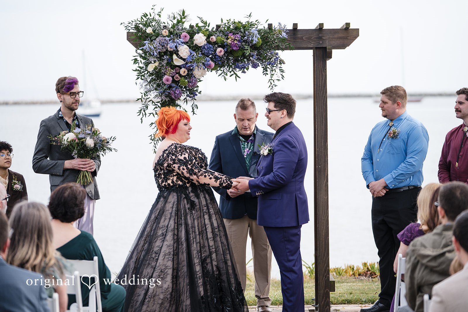 Morgan + Todd Bride and groom holding hands during the wedding ceremony