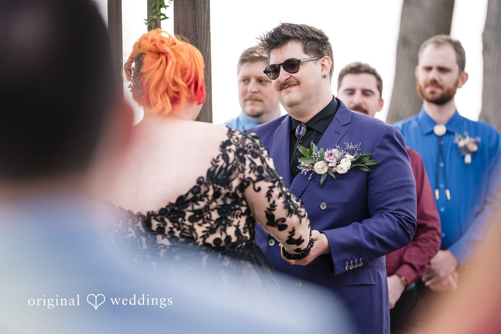 Morgan + Todd Couple exchanging vows during the outdoor ceremony