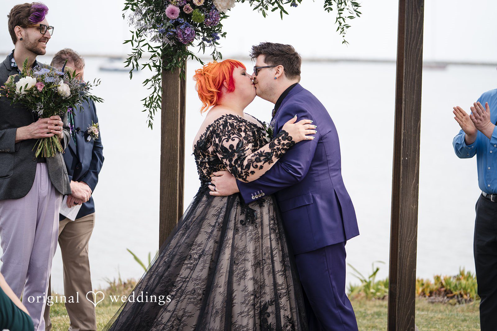 Morgan + Todd Bride and groom sharing their first kiss after the vows