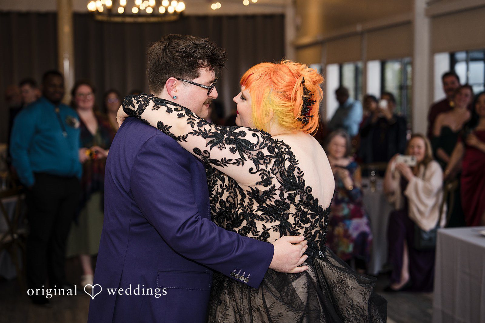 Morgan + Todd Bride and groom sharing their first dance at the reception