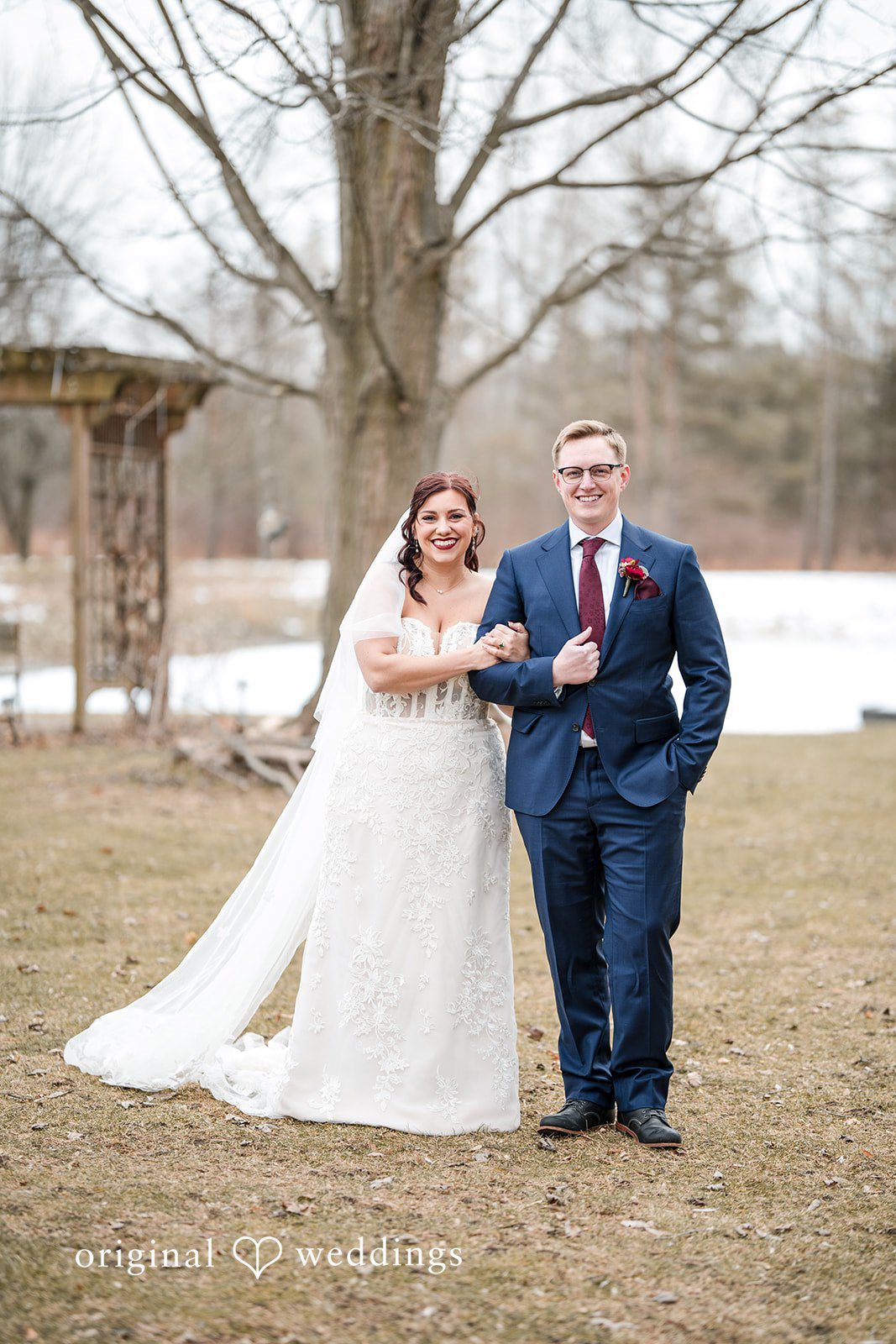 Logan + Bryan Beautiful couple sharing joyful wedding day memories outdoors
