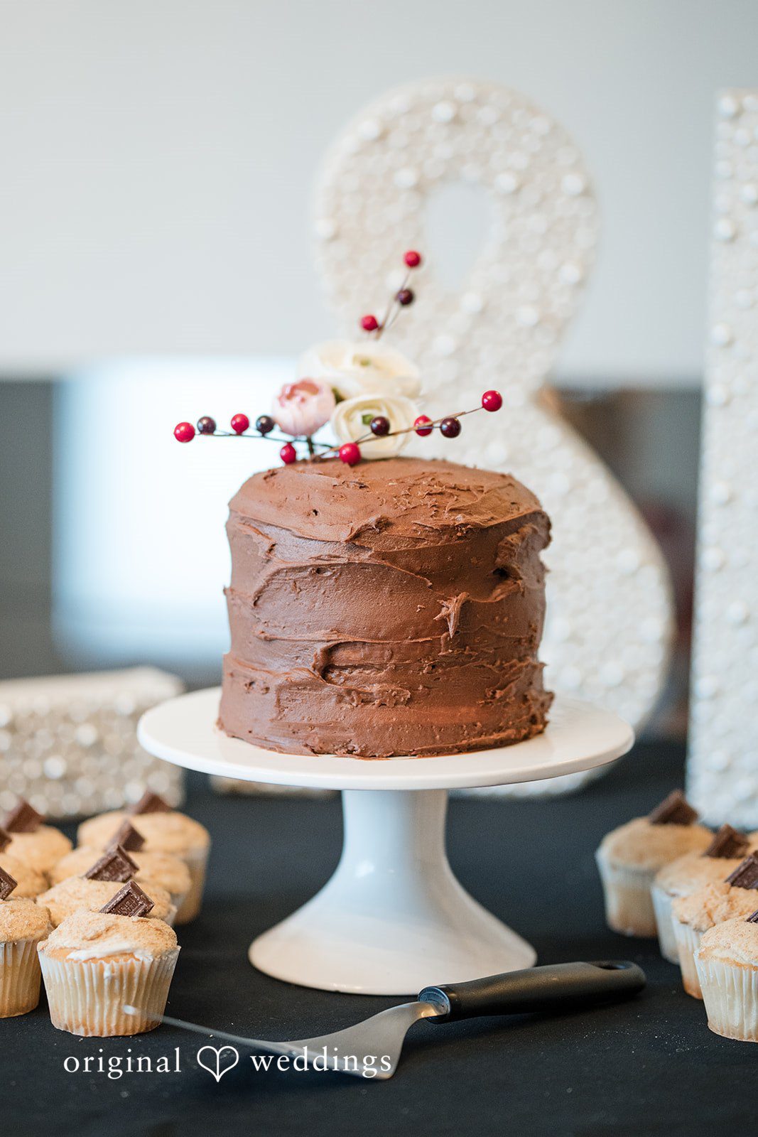 Logan + Bryan Romantic wedding cake detail captured by Detroit Wedding Photographers fromOriginal Weddings