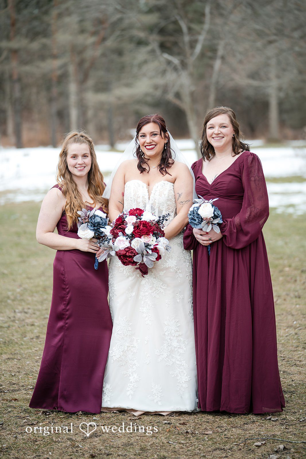 Logan + Bryan Bride posing with bridesmaids