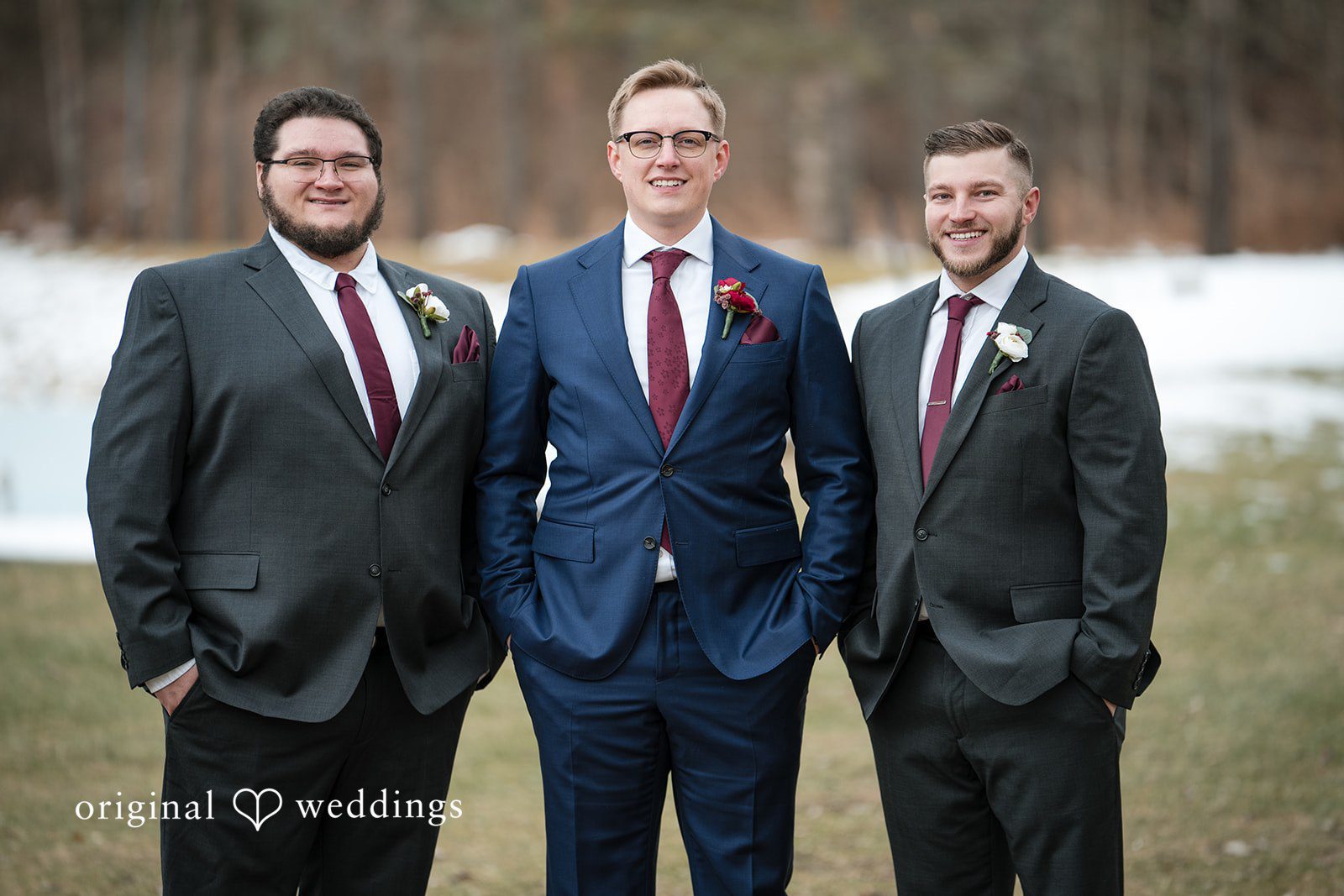 Logan + Bryan Groom posing with groomsmen