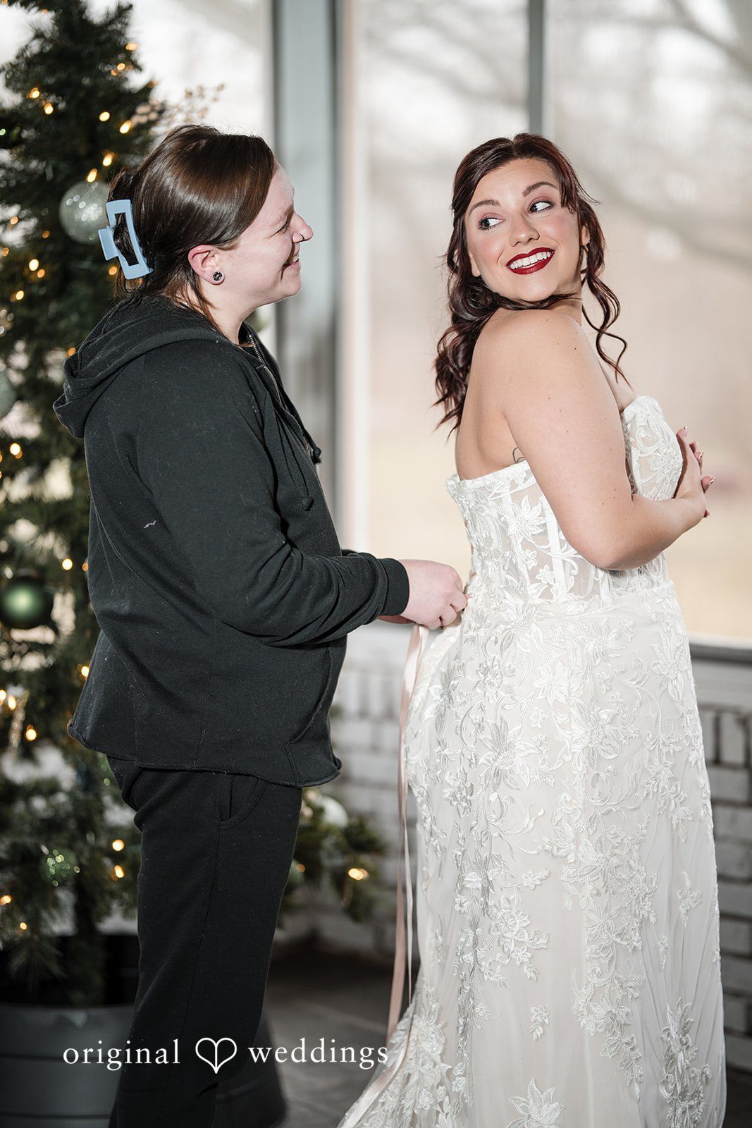 Logan + Bryan Bridesmaid helping bride get ready
