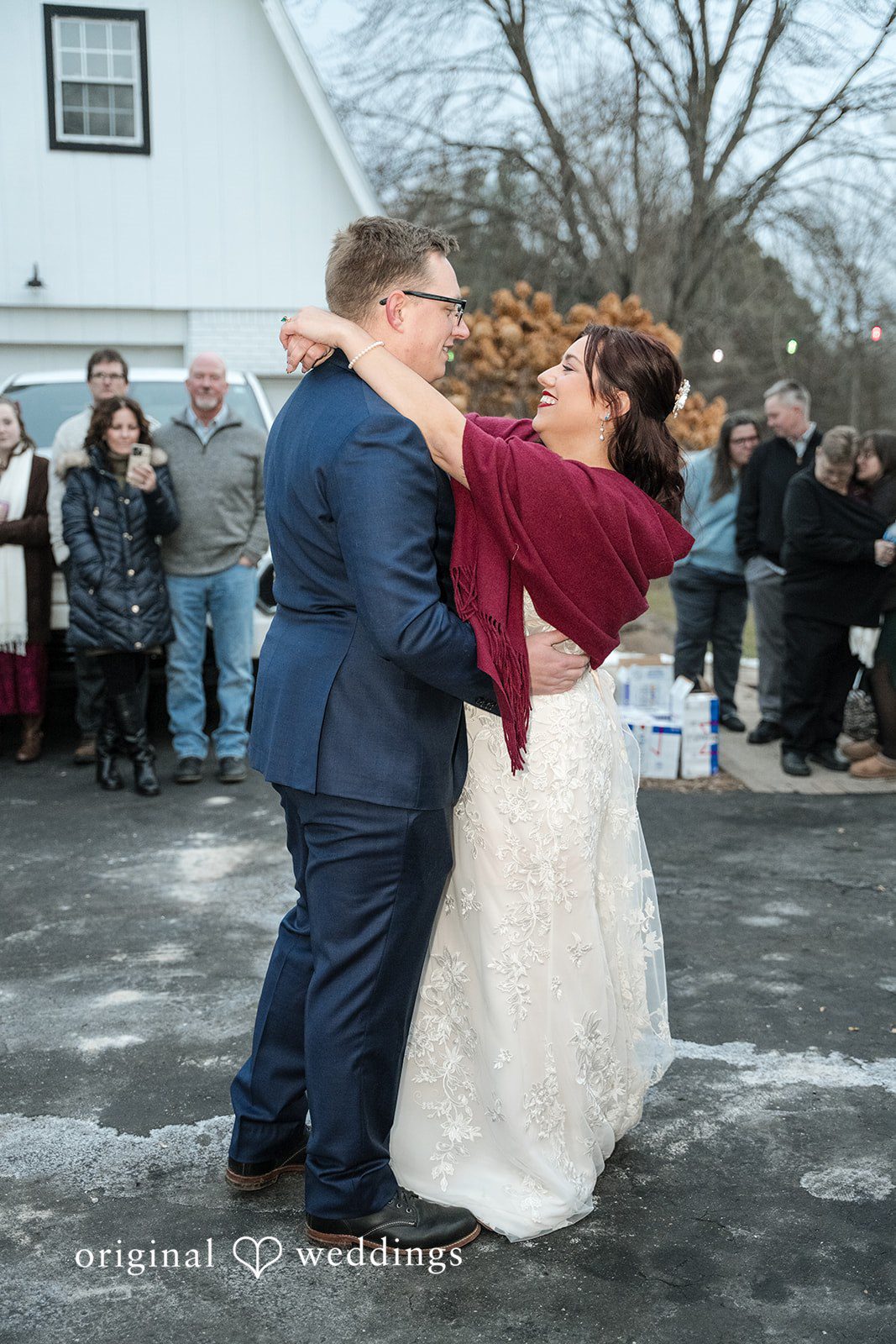 Logan + Bryan Bride and groom sharing their first dance during intimate backyard wedding celebration