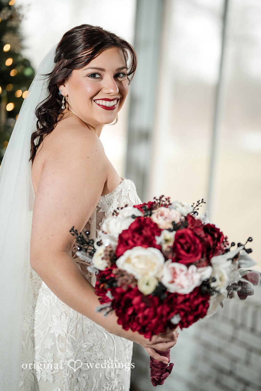 Logan + Bryan Beautiful bride portrait holding bouquet at Michigan Backyard