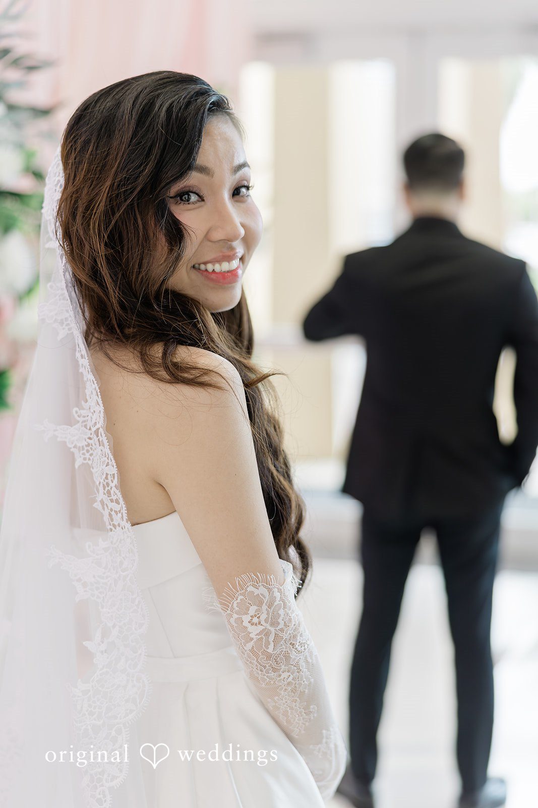 Khanh + Trung Close-up of the groom waiting with his back turned before the first look