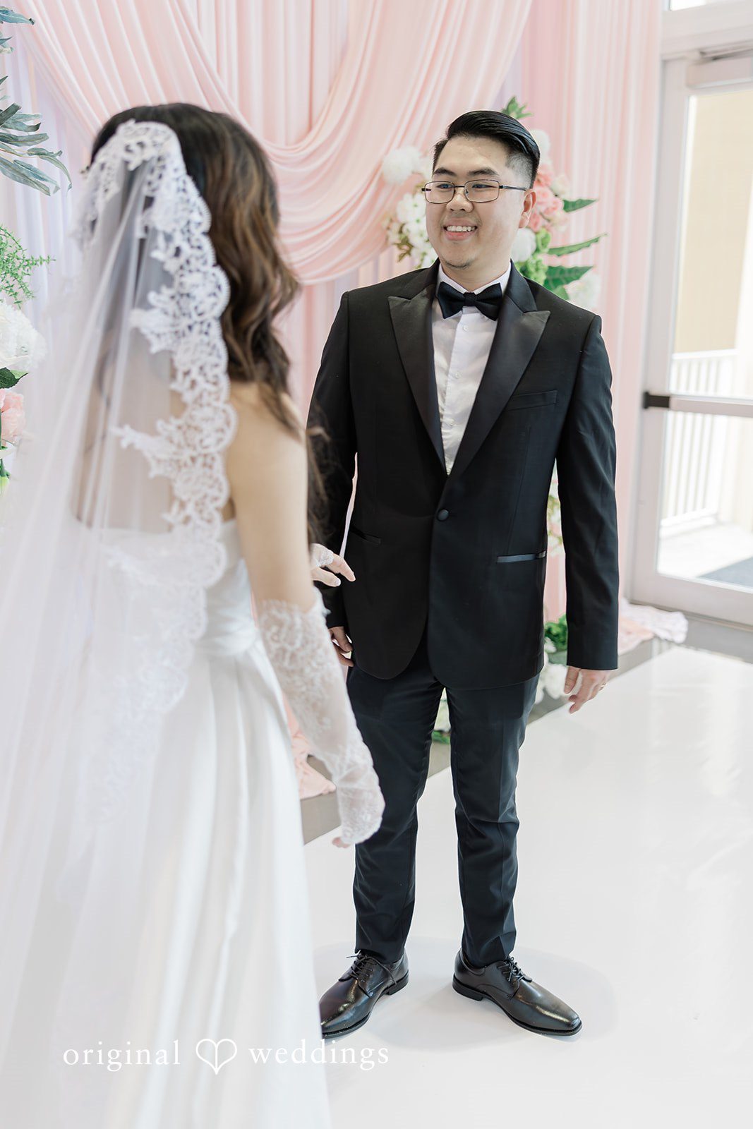 Khanh + Trung Emotional first look moment between the bride and groom