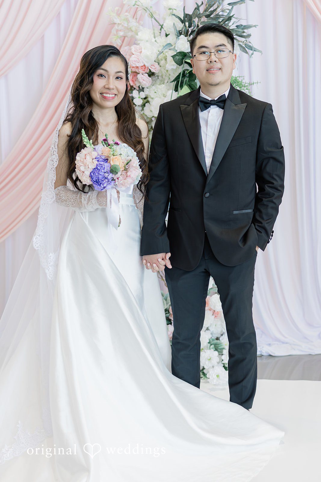 Khanh + Trung Full-length portrait of the bride and groom during the wedding day