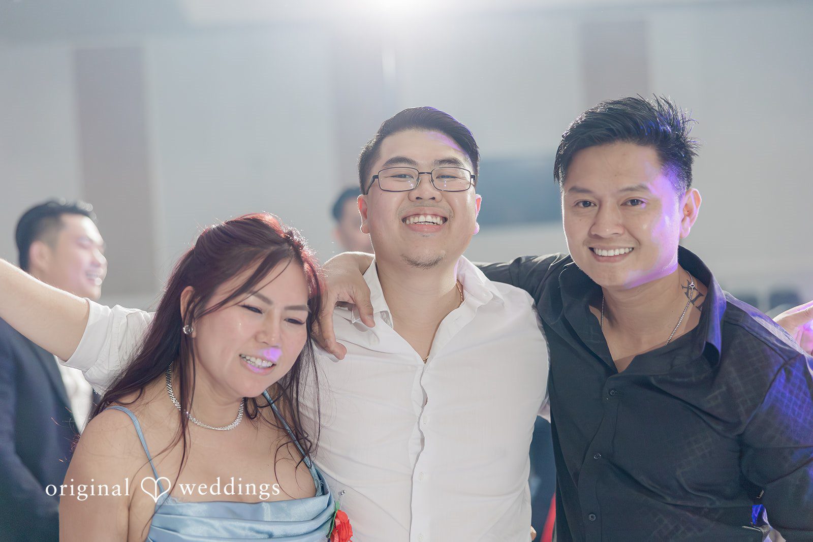 Khanh + Trung Groom posing with friends during the wedding celebration