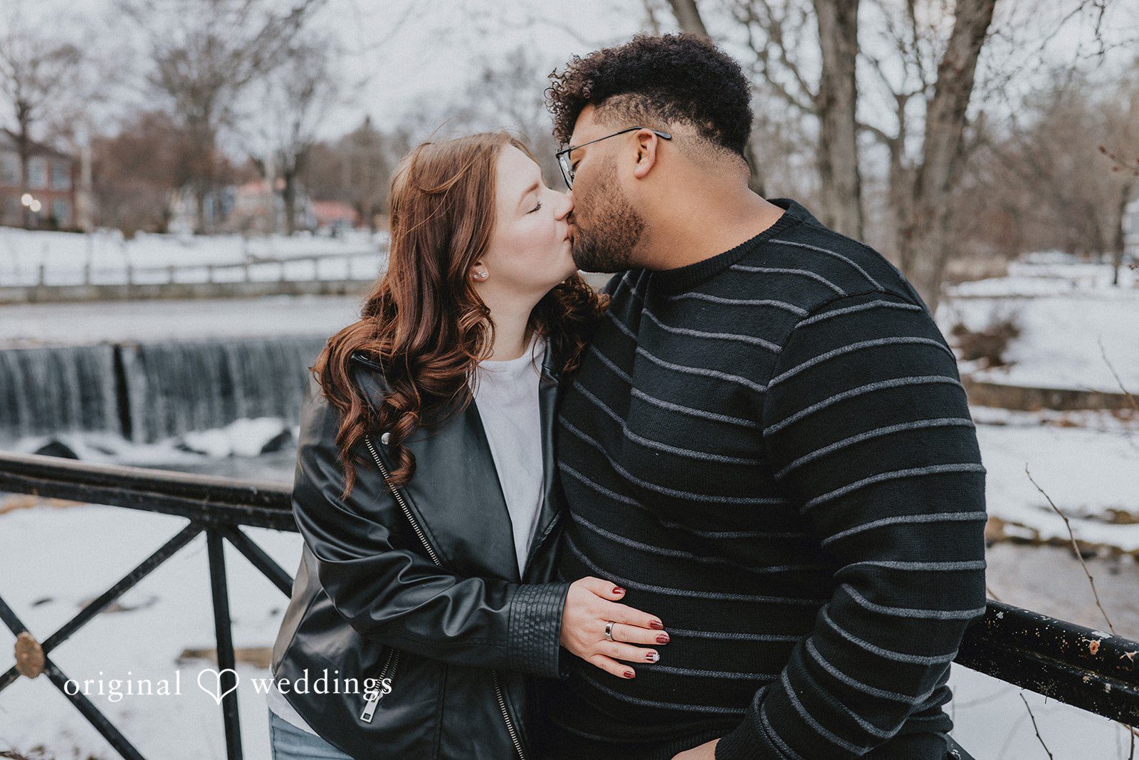Amanda + Declan The couple shares a romantic kiss at Milford Duck Pond