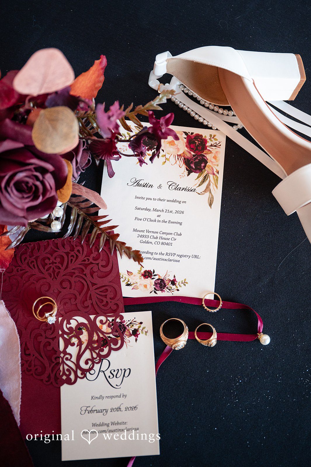 A detail shot of the wedding rings and florals
