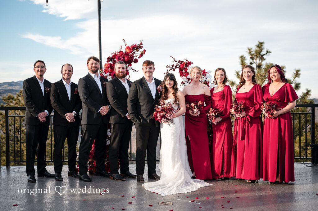 Our Denver wedding photographers at Original Weddings captured a stunning portrait of the couple and their bridal party at Mount Vernon Canyon Club