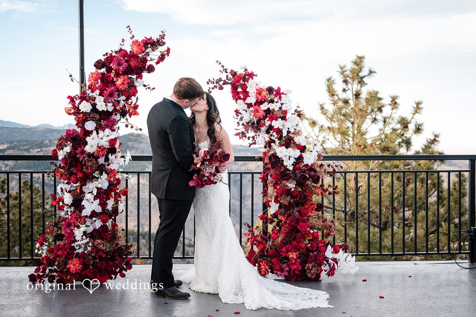 The couple shares a romantic kiss