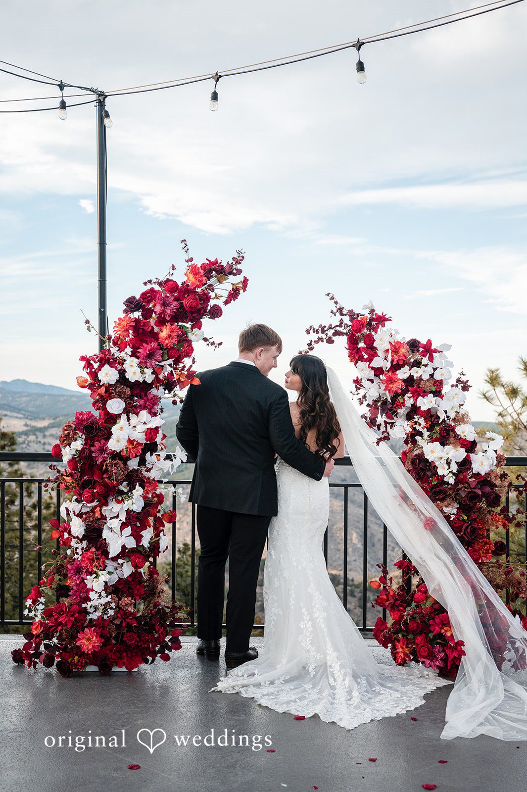 A portrait of the couple on the deck
