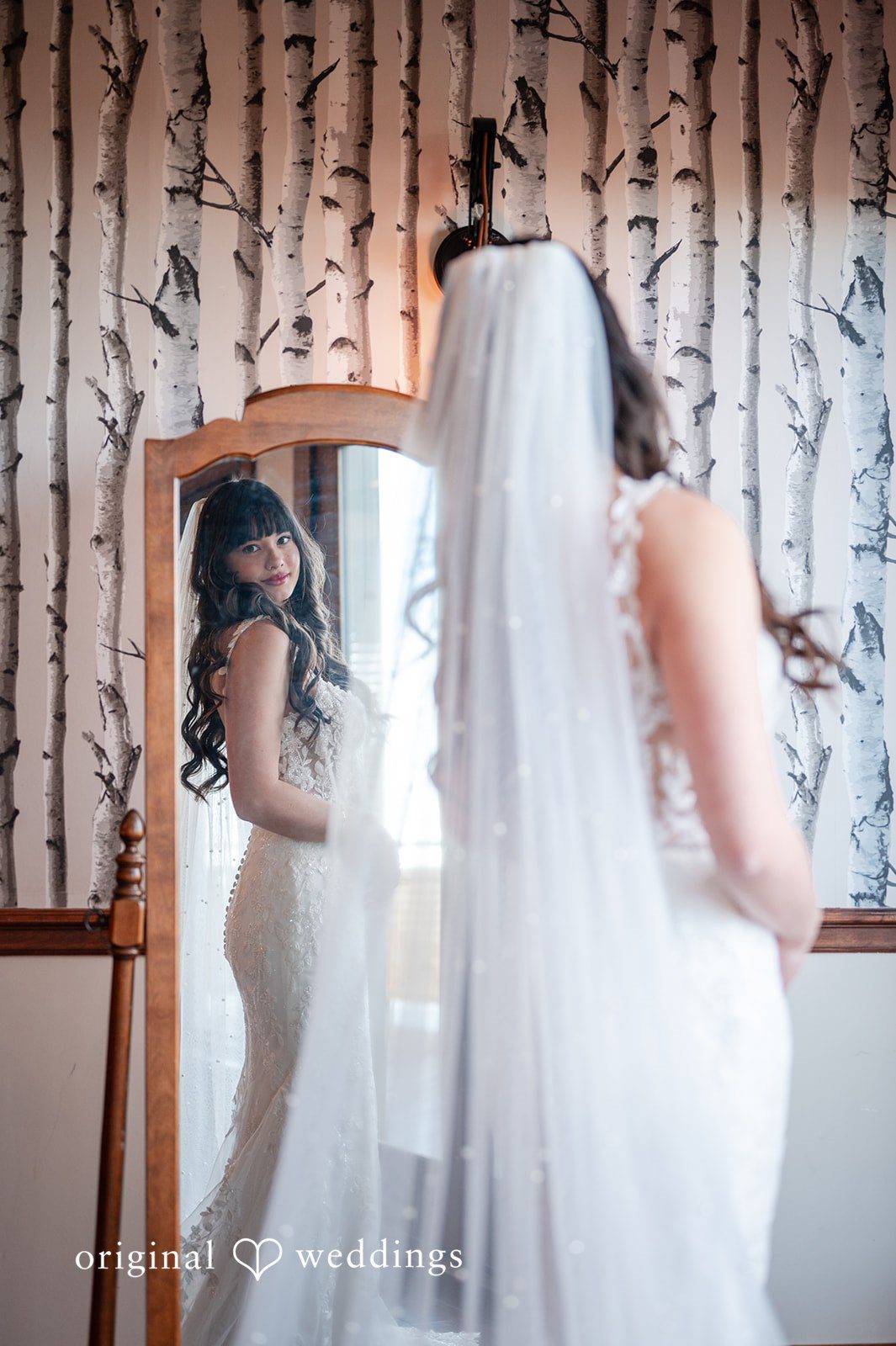 A getting-ready portrait of the bride in the suite