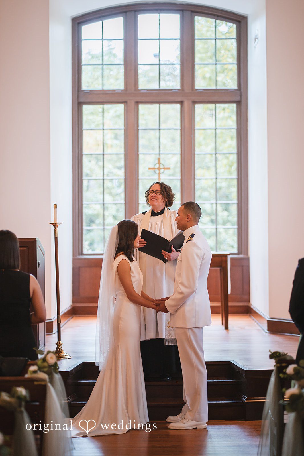 Peyton + Mia Bride and groom sharing vows during the wedding ceremony