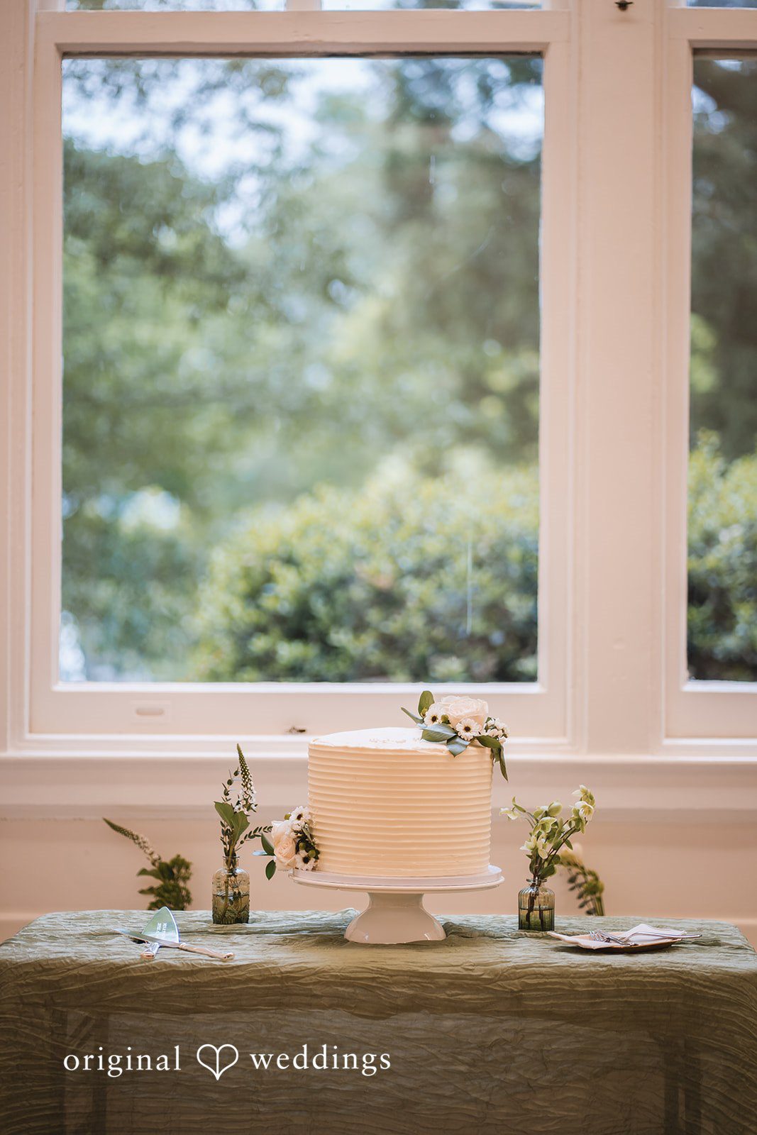 Peyton + Mia Elegant wedding cake displayed on the reception table