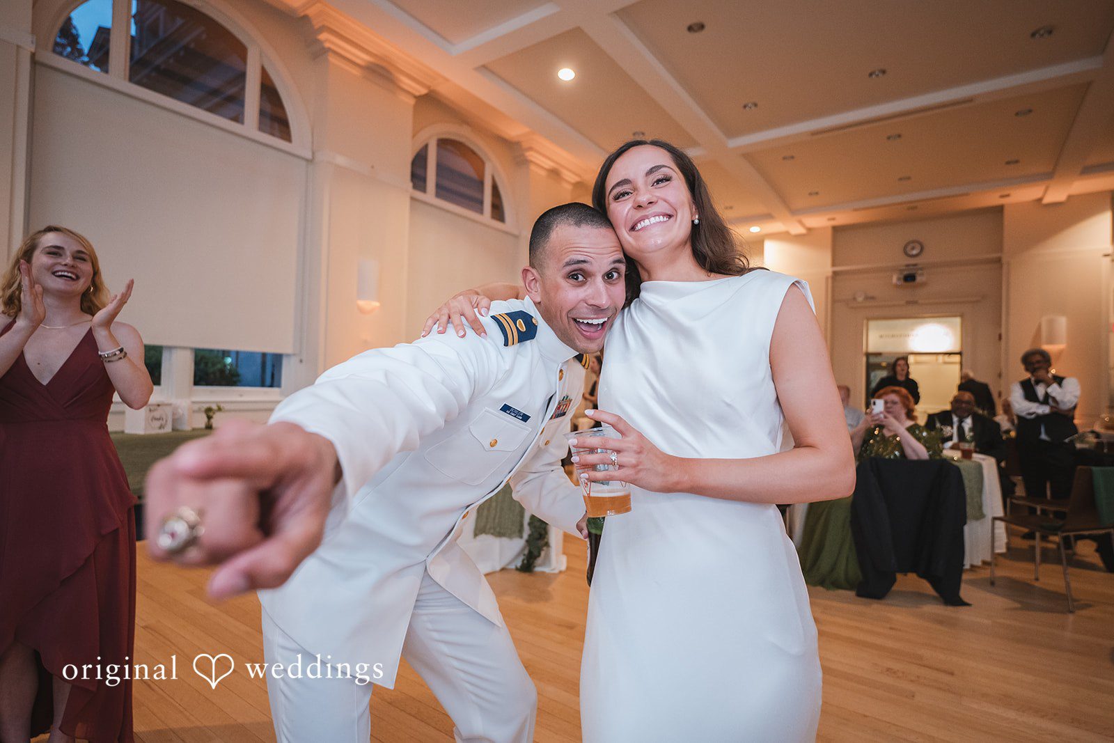 Peyton + Mia Bride and groom enjoying fun moments at the wedding reception