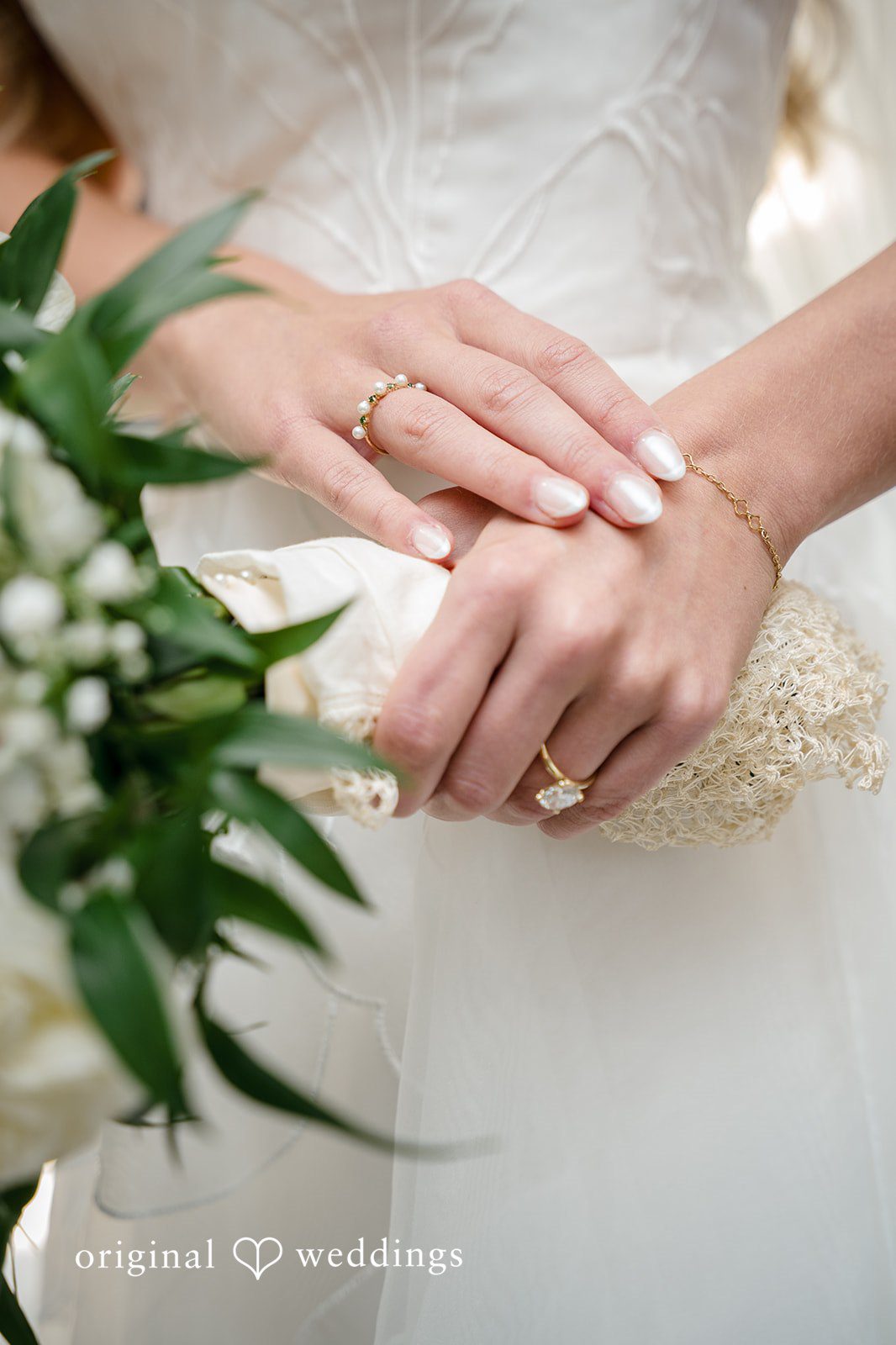 Close-up of the bride’s bouquet and wedding ring