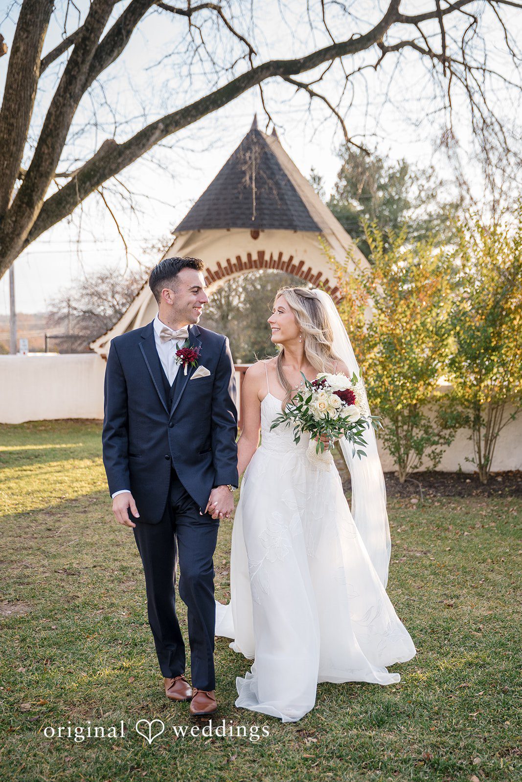 Couple portrait with trees and bouquet details outdoors