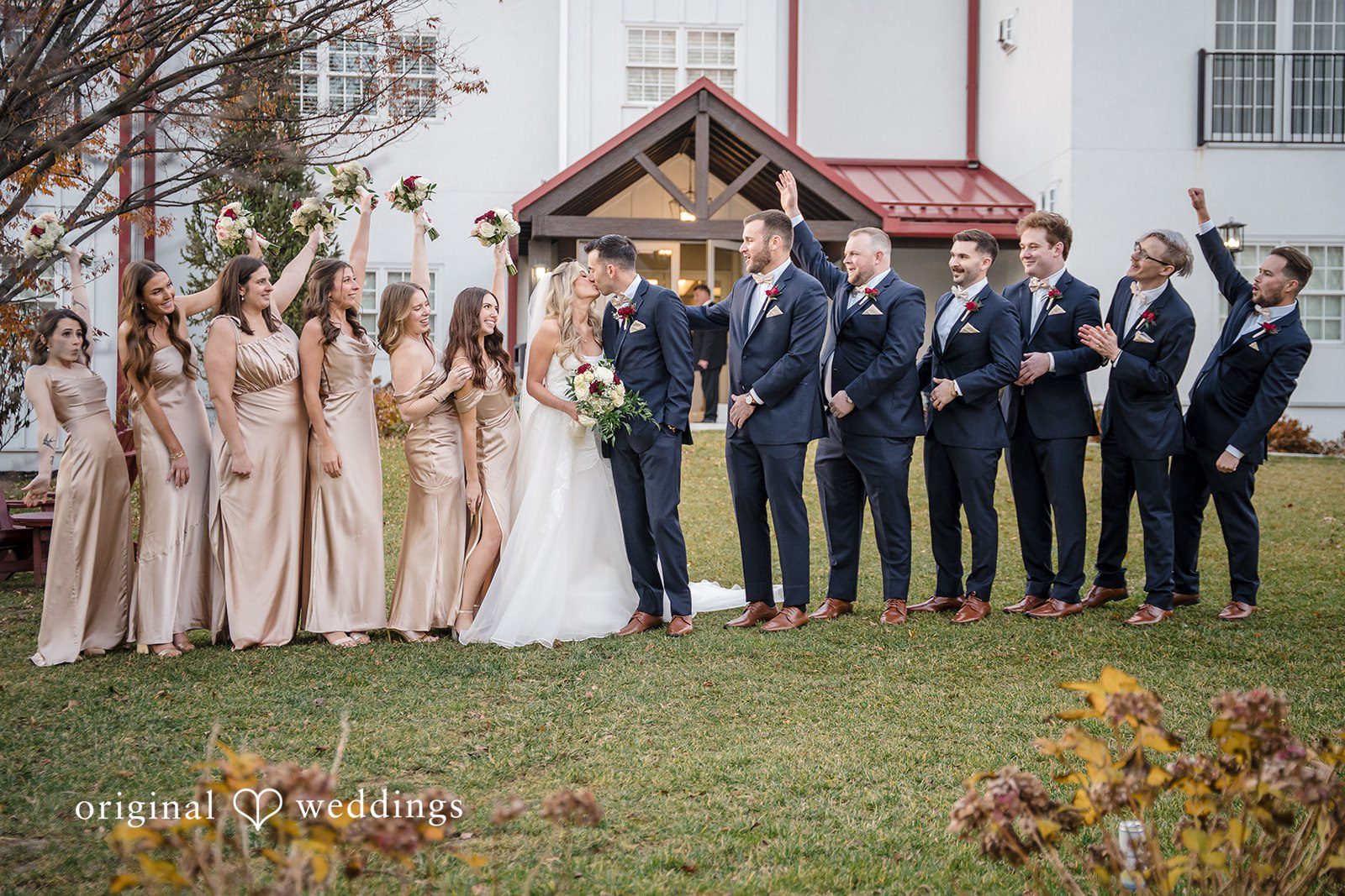 Bride posing with bridesmaids before the ceremony