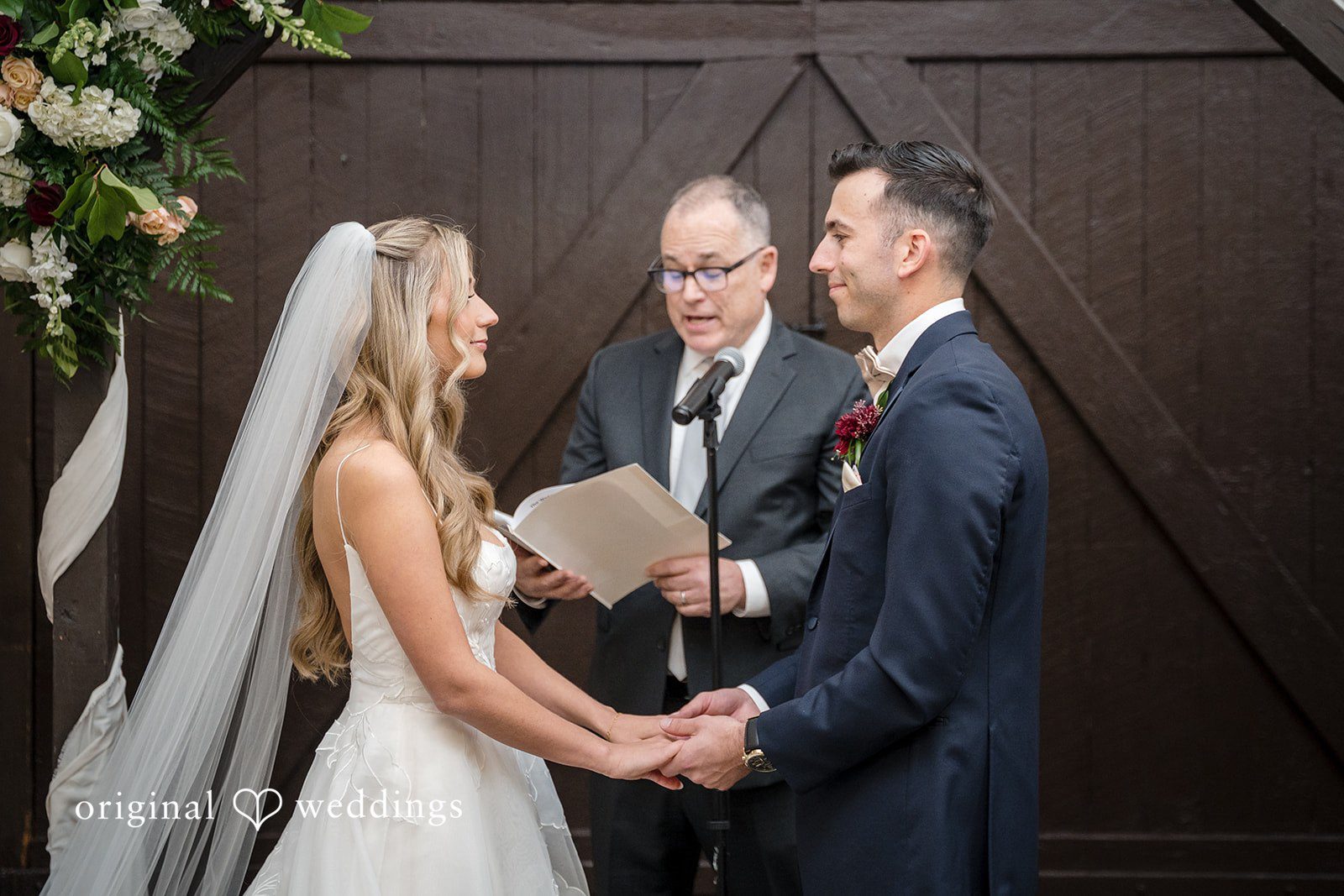 Bride and groom exchanging vows during the wedding ceremony