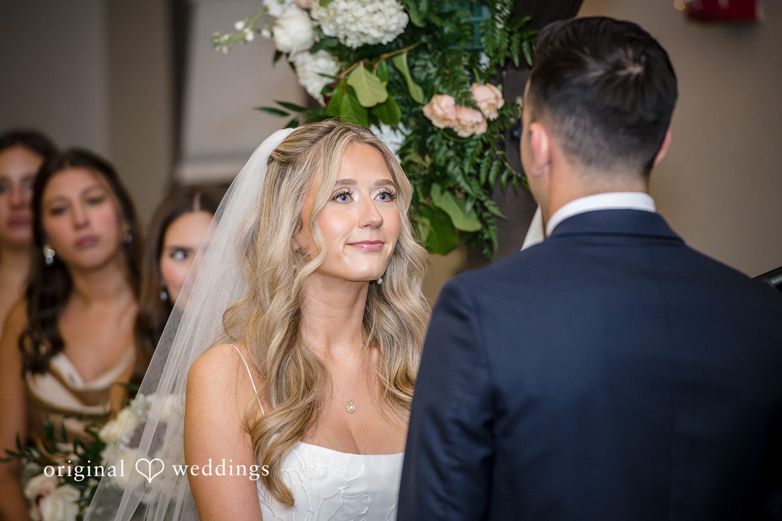 Couple sharing an emotional look during the ceremony