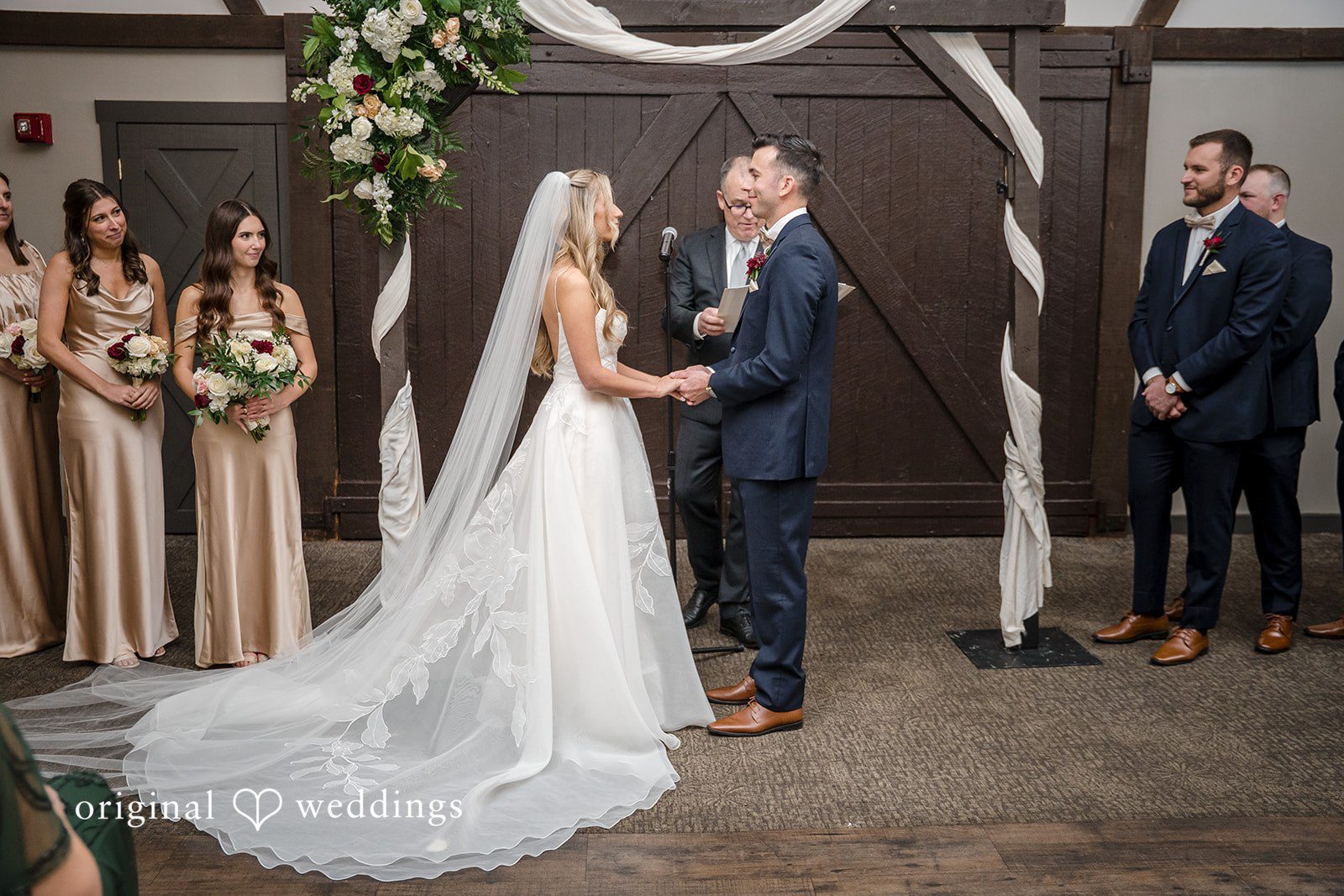 Bride and groom sharing their first vow exchange