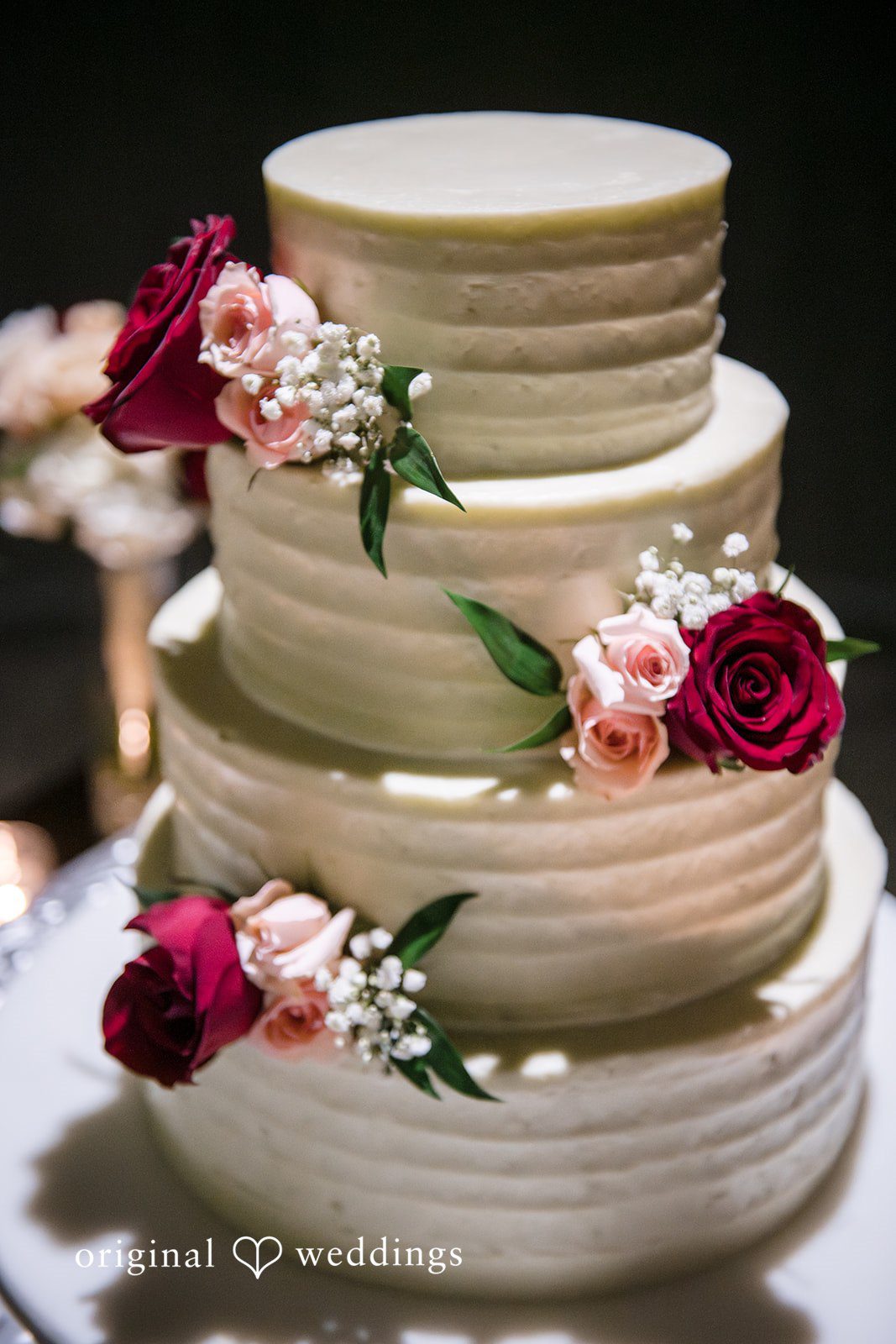Floral wedding cake decorated with elegant blooms