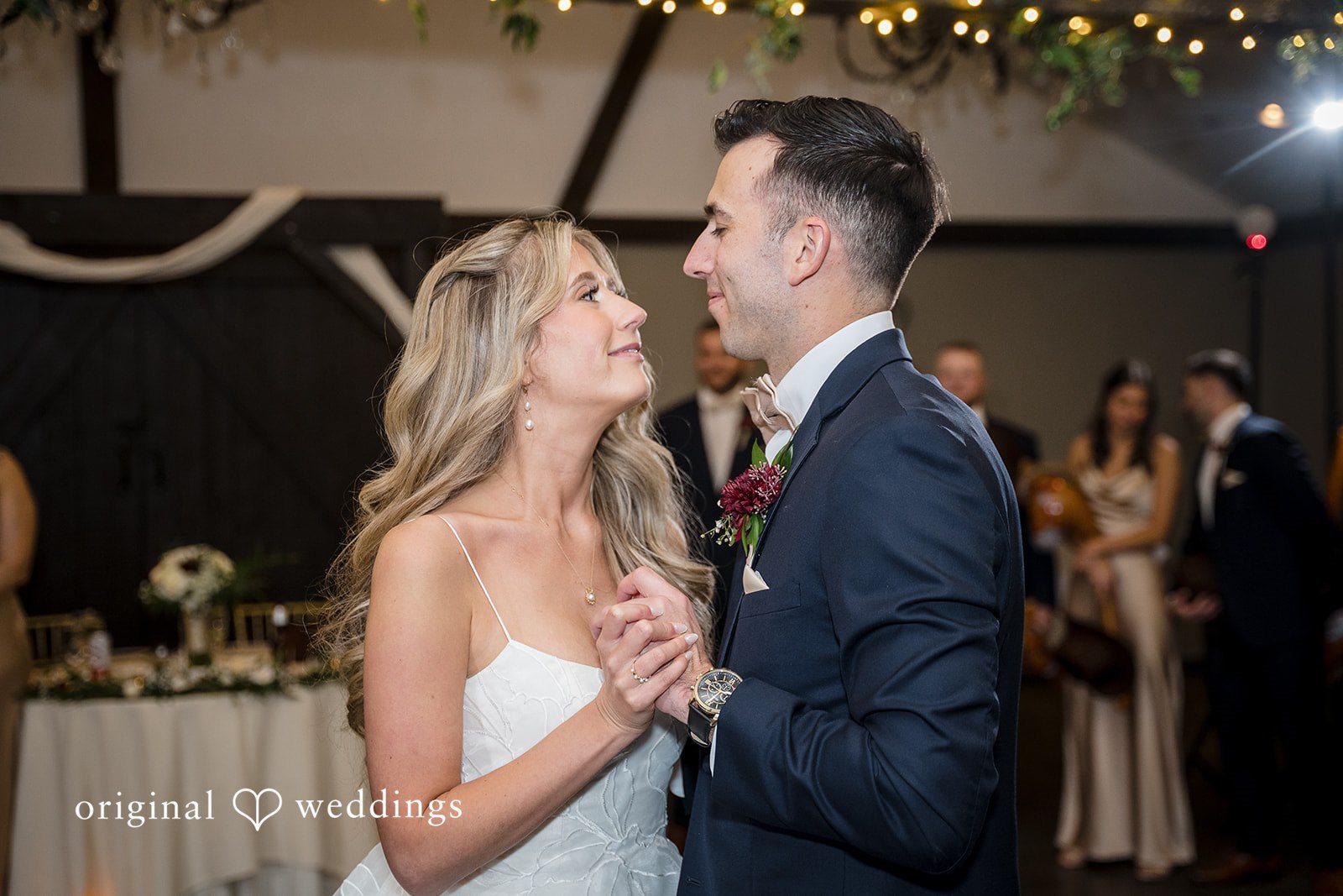 Bride and groom sharing their first dance at the reception