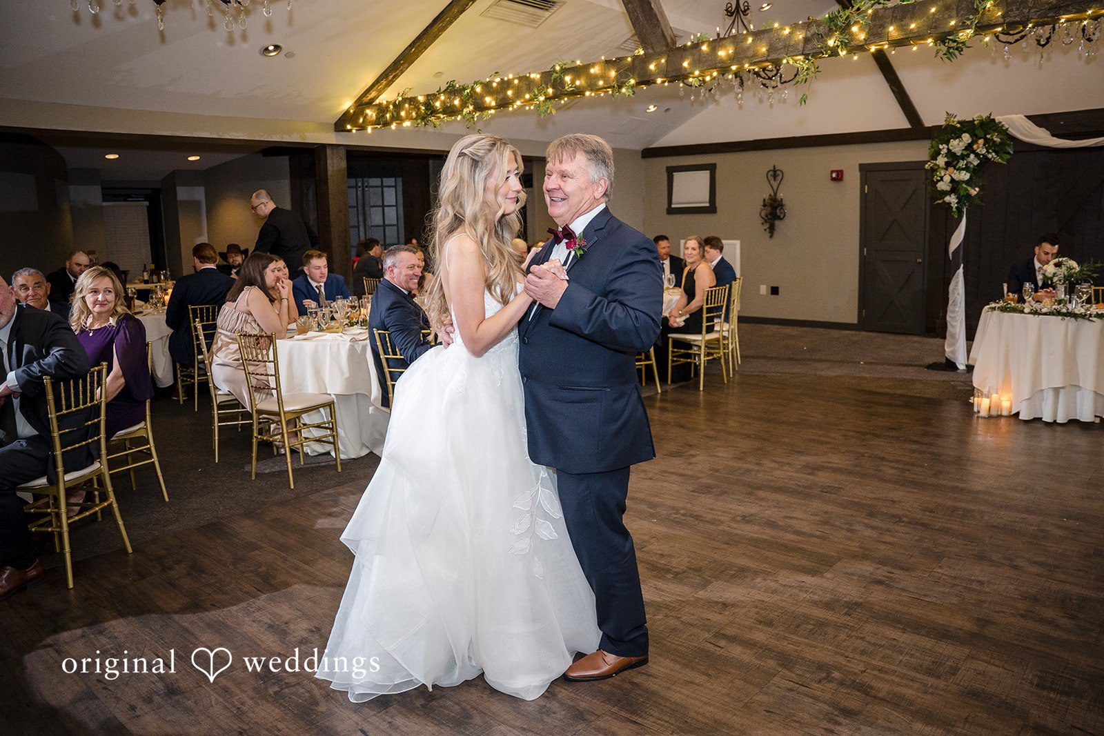 Bride dancing with her father during the reception