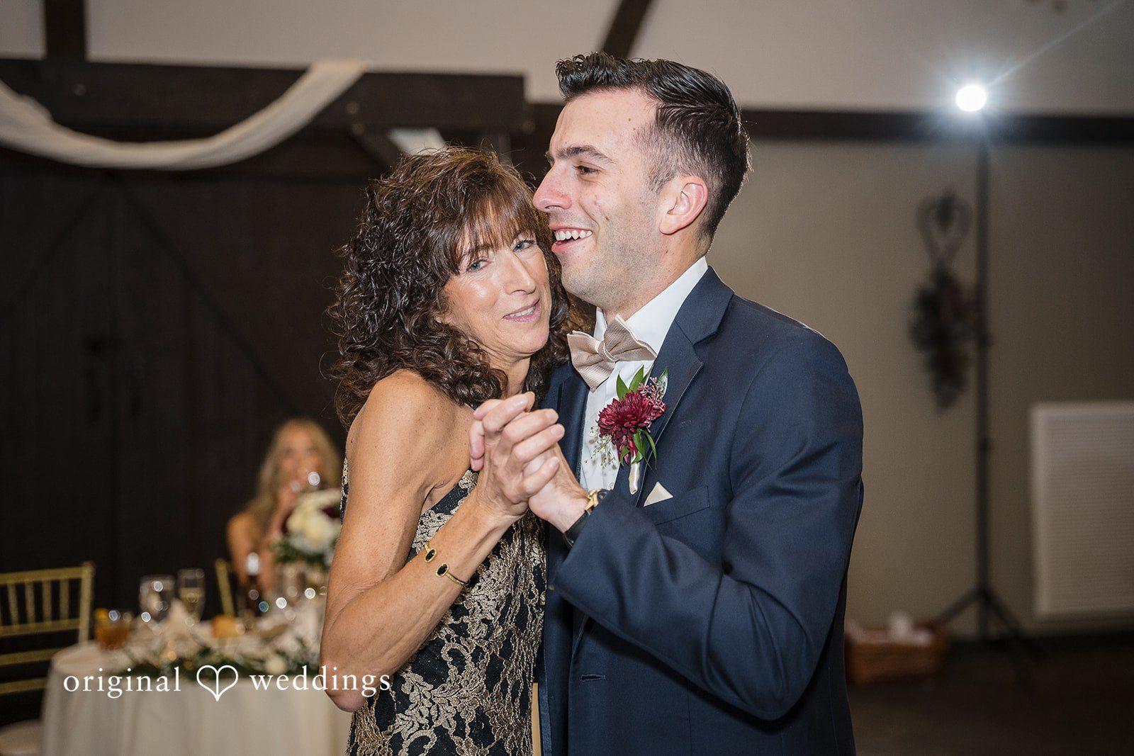 Groom dancing with his mother during the wedding celebration
