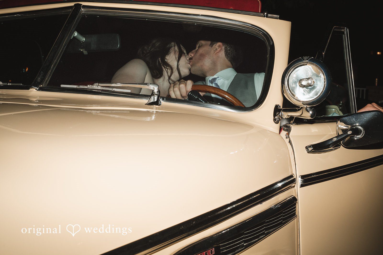The couple shares a romantic kiss