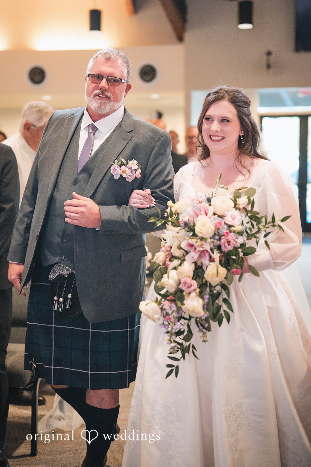 Our Phoenix wedding photographers captured the moment the bride's father walked the bride down the aisle