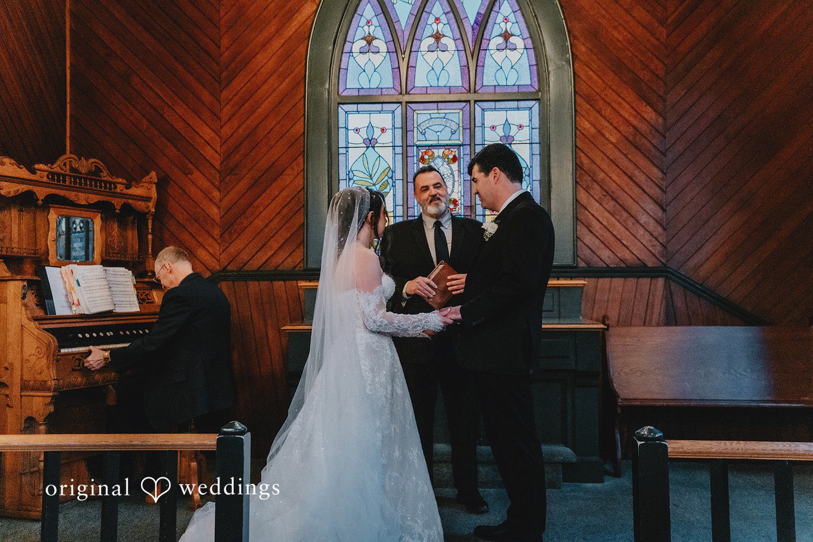 Claire + Richard The bride and groom exchange marital vows