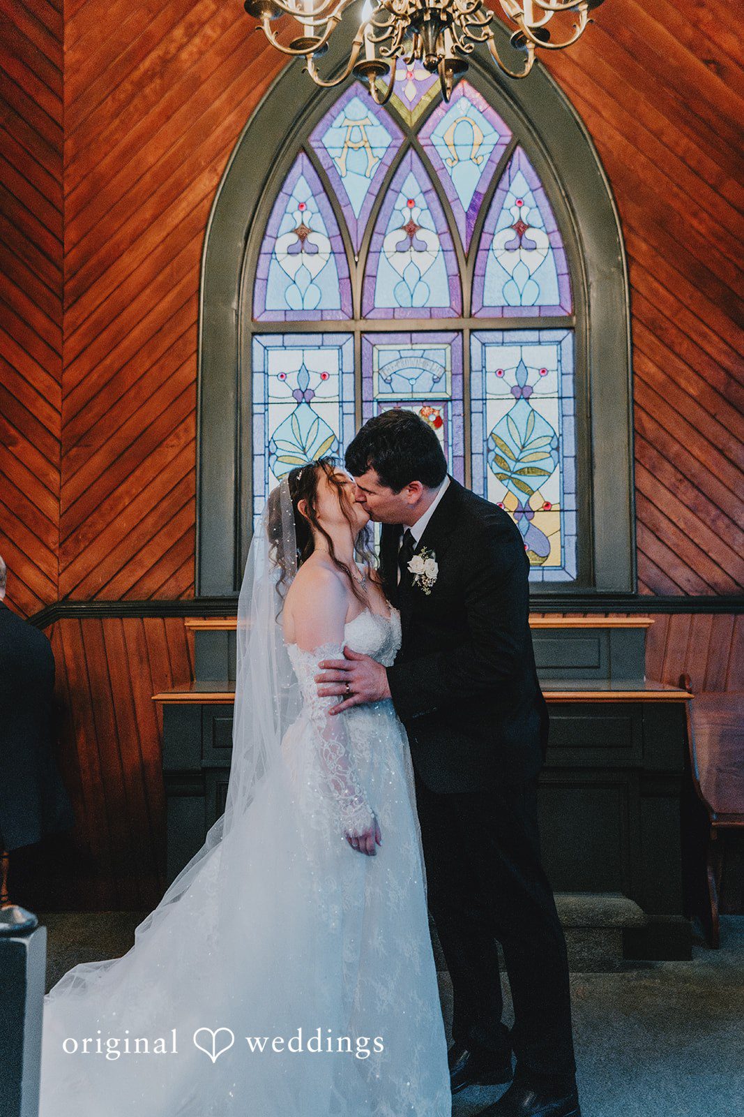 Claire + Richard The couple takes their first kiss