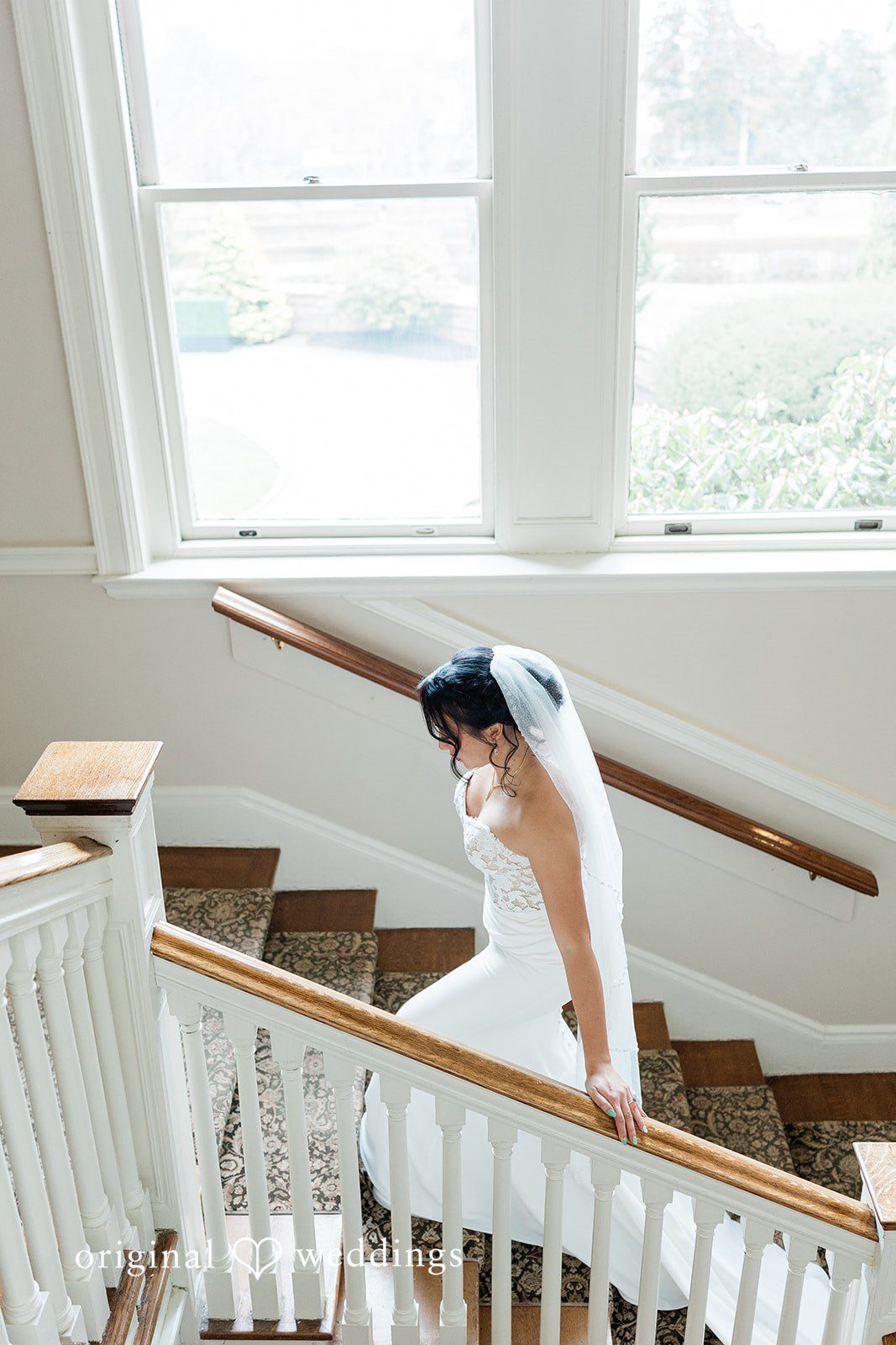 The bride ascends the stairs at OceanCliff