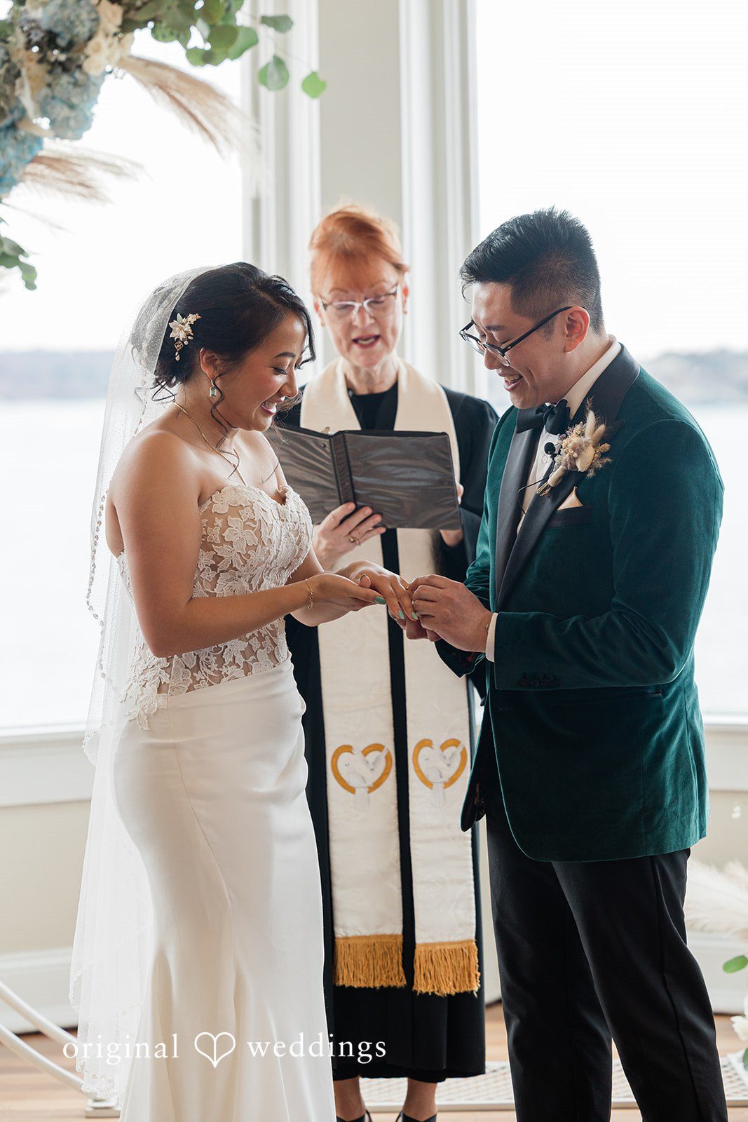 The couple exchanges rings