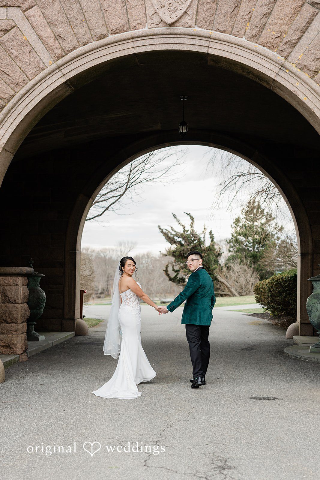 Our Providence wedding photographers captured a portrait of the couple by the stone patio