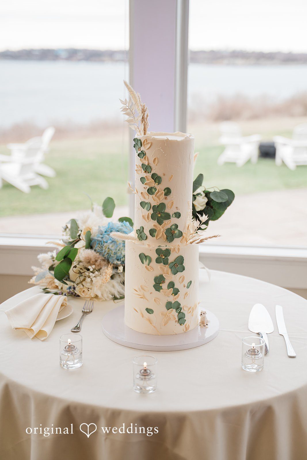 A beautiful 2-teir wedding cake adorned with florals