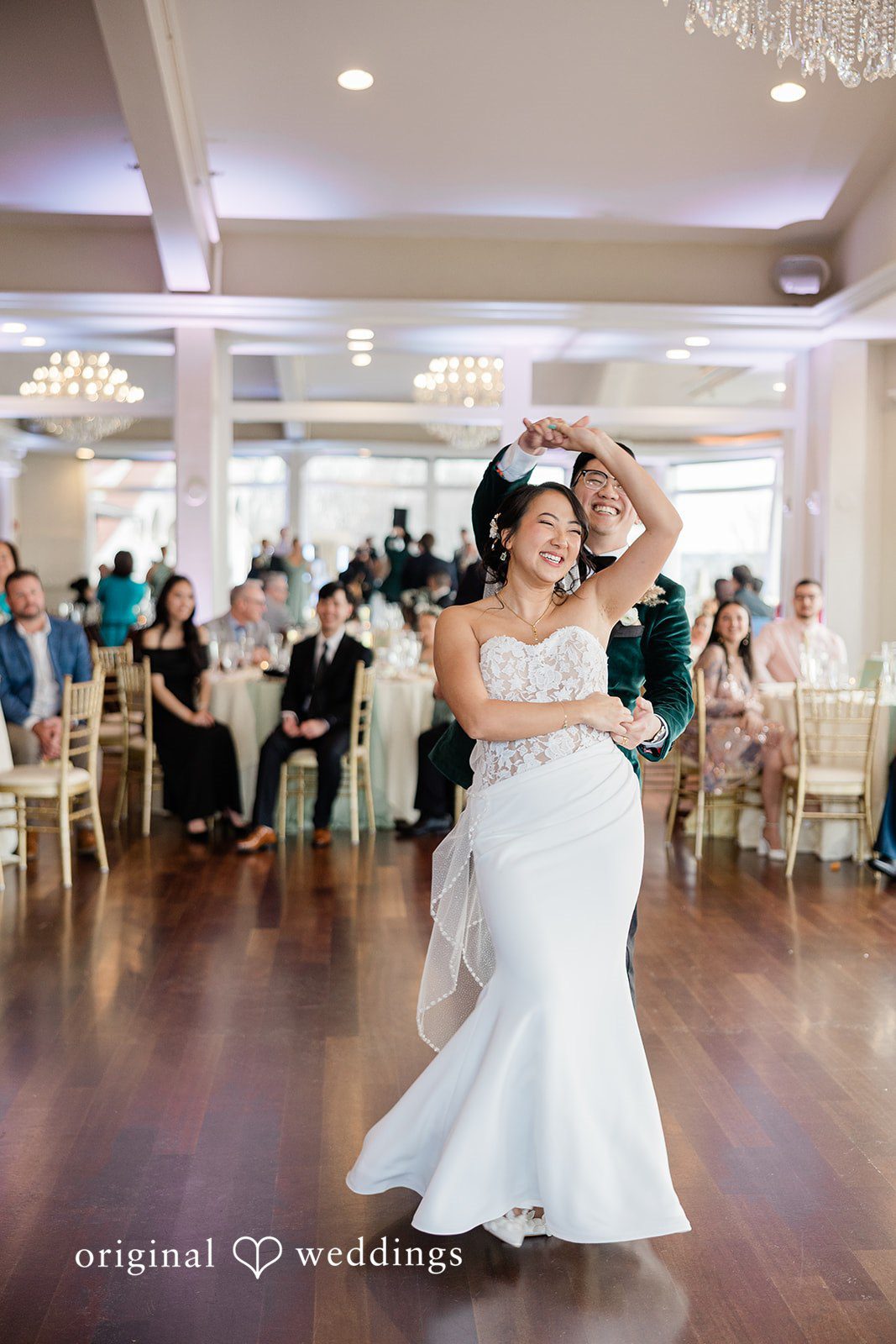 The couple takes their first dance