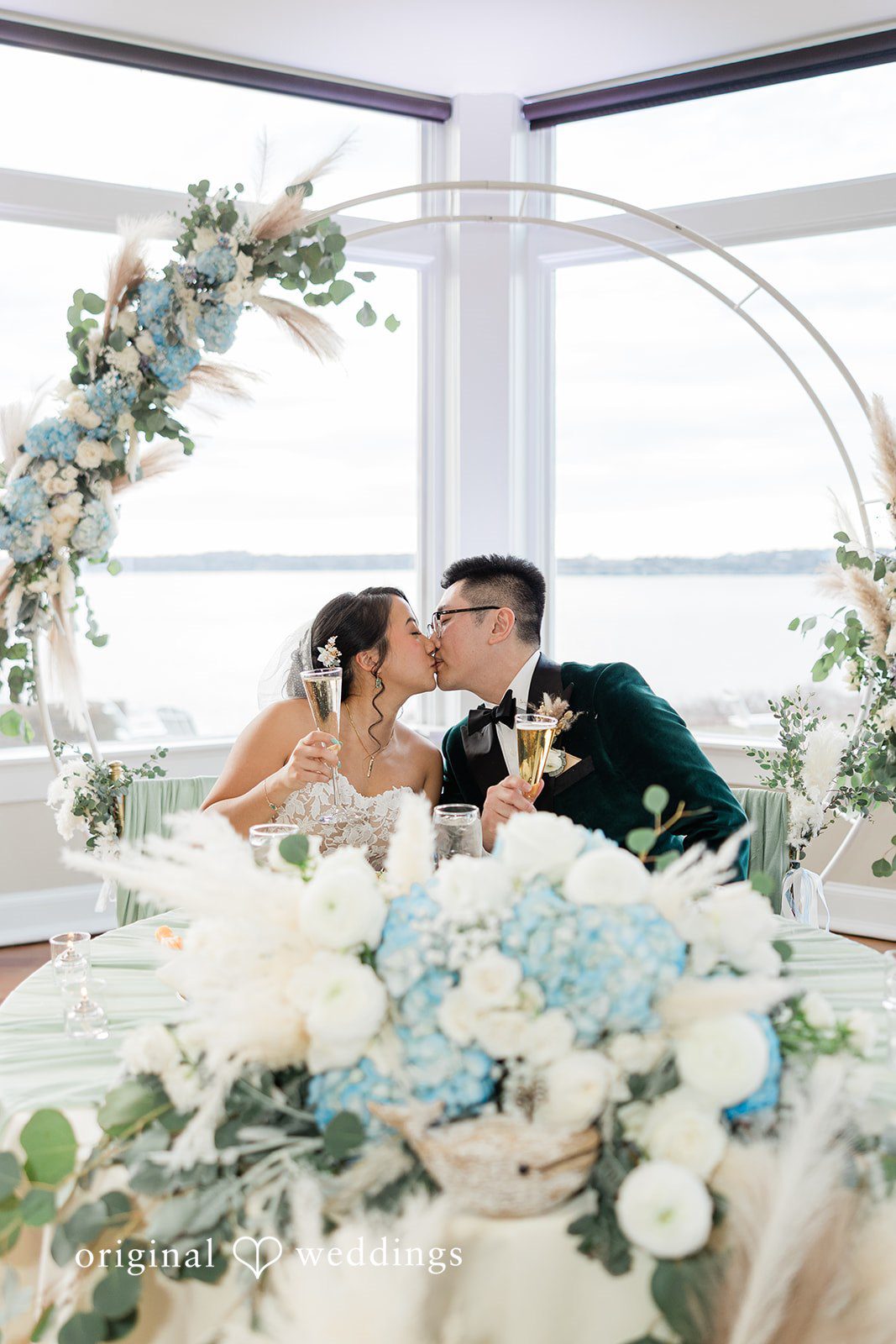 The couple shares a kiss