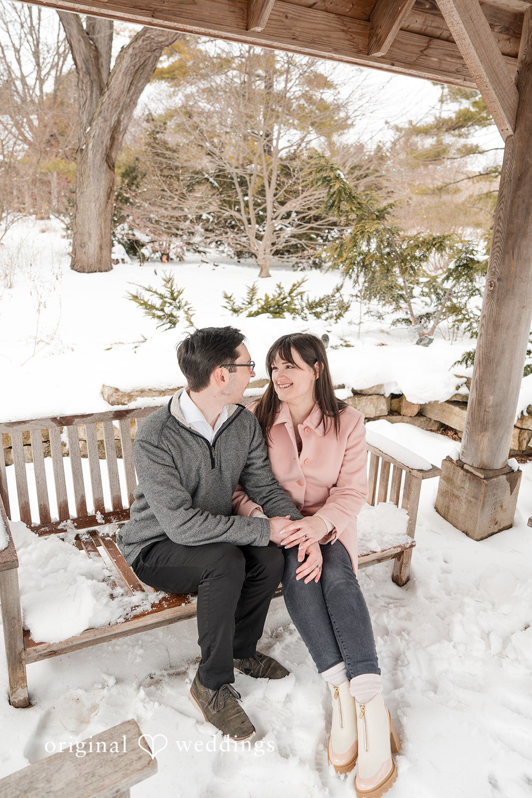 Couple looking and smiling at each other at Olbrich Gardens