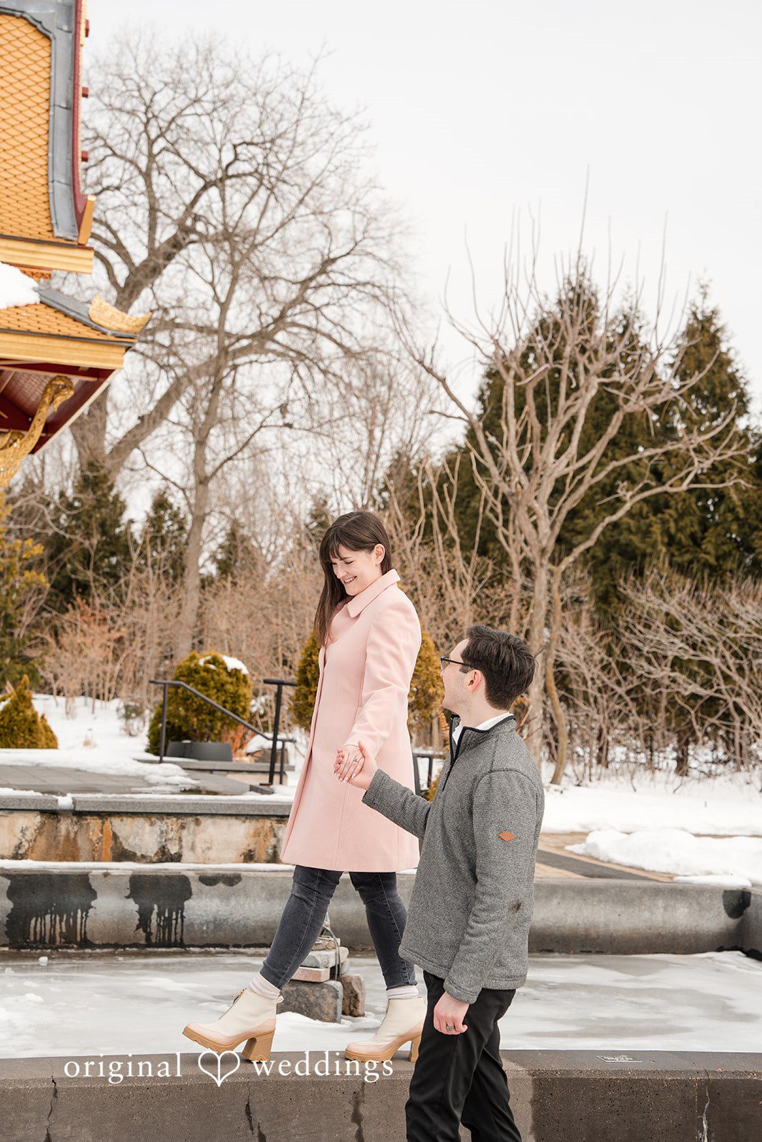 Couple holding hands moment at Olbrich Gardens