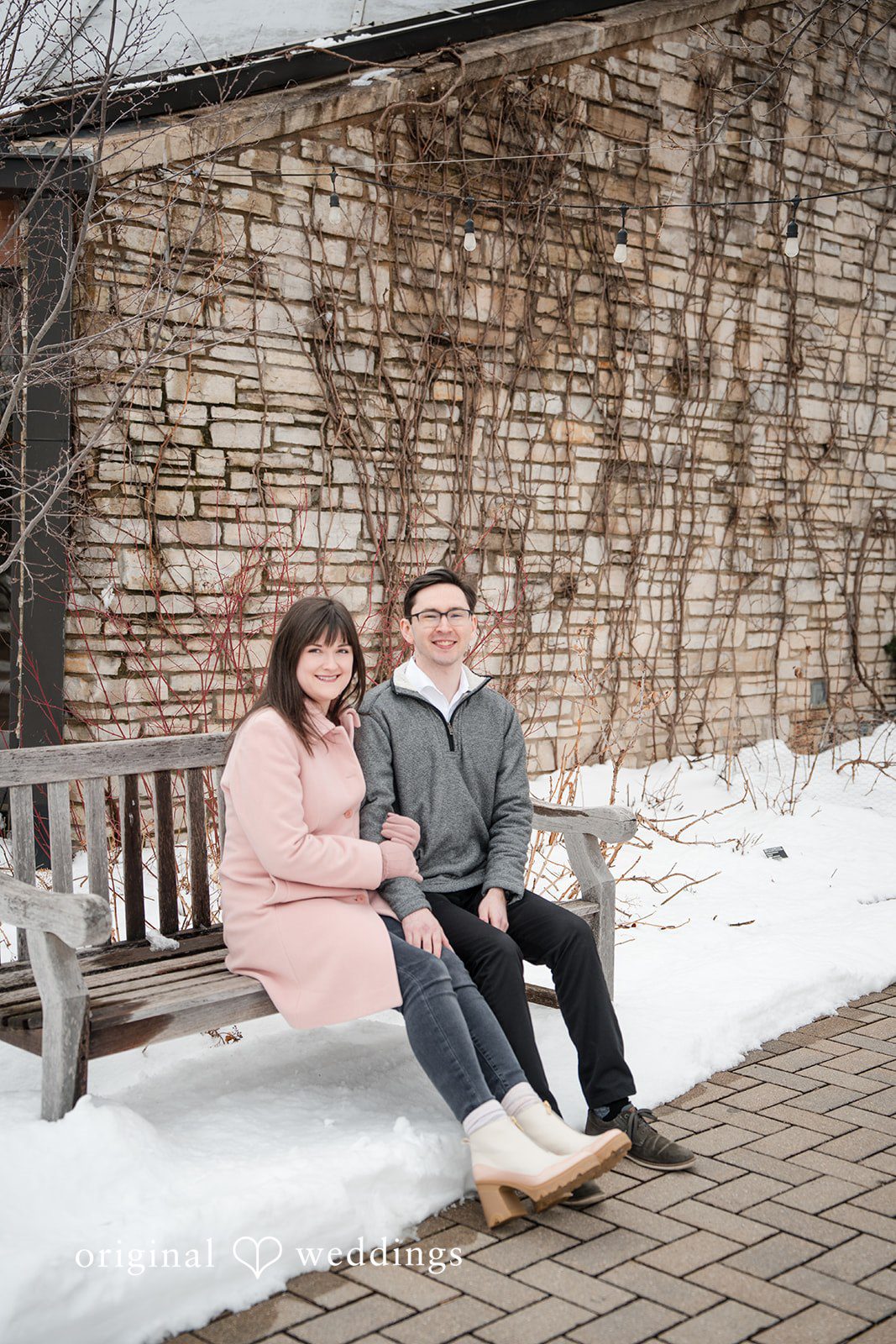 Couple seated together on a bench