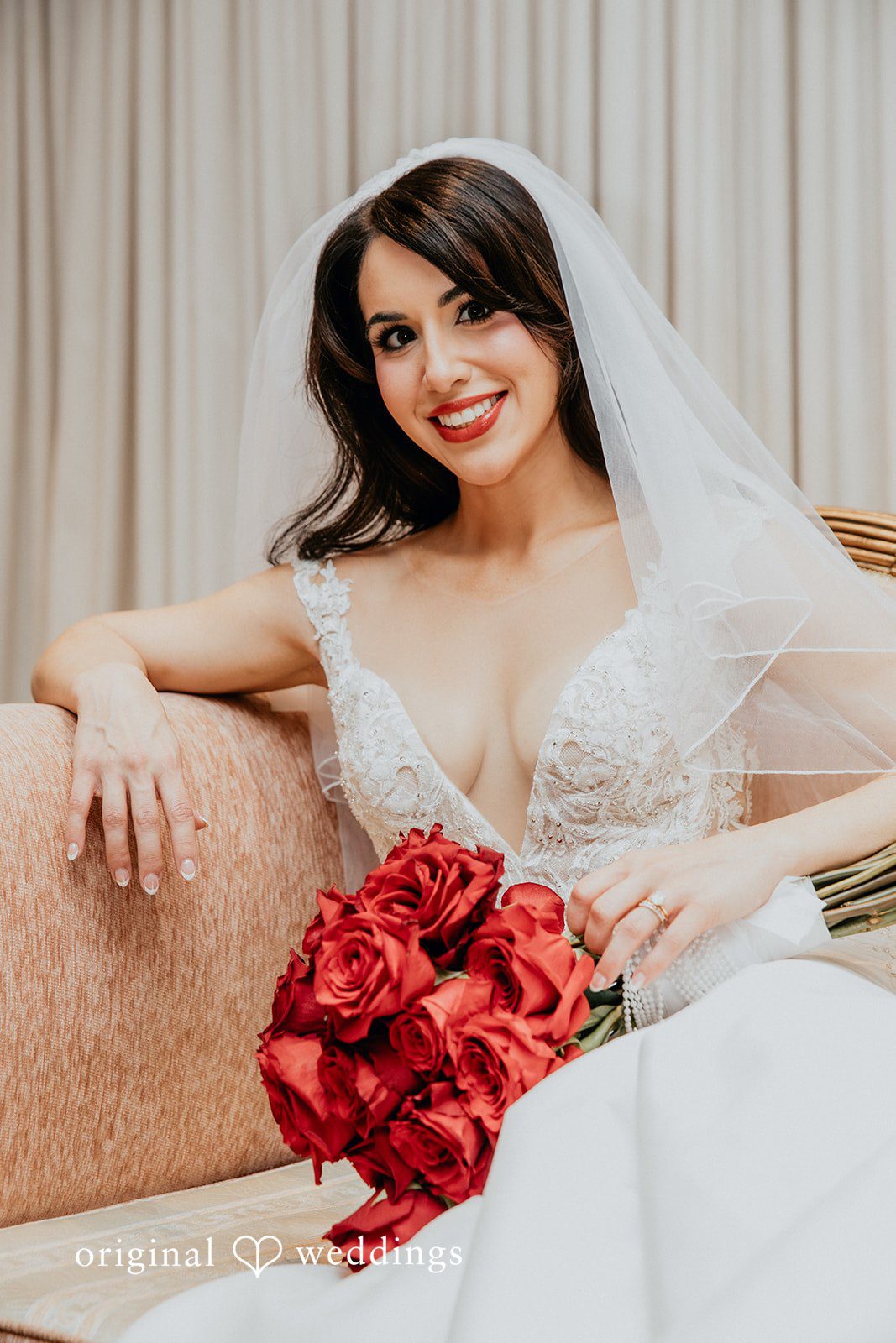 Bride solo portrait seated elegantly